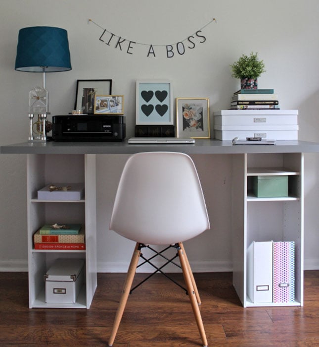 Neat, organised study desk and chair, with a sign above the desk saying 'Like a boss'.jpg