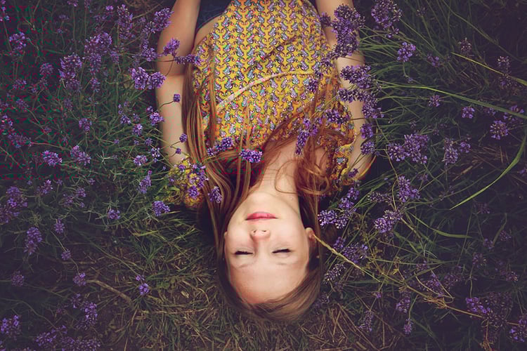 Girl-in-flowers-field.jpg