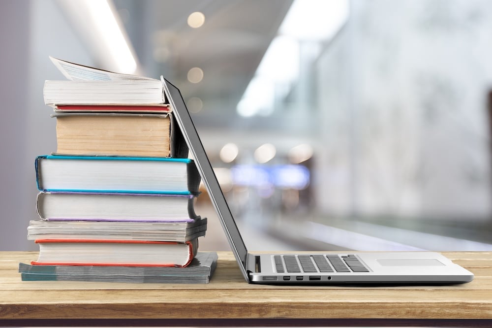 Books and a laptop in a study area
