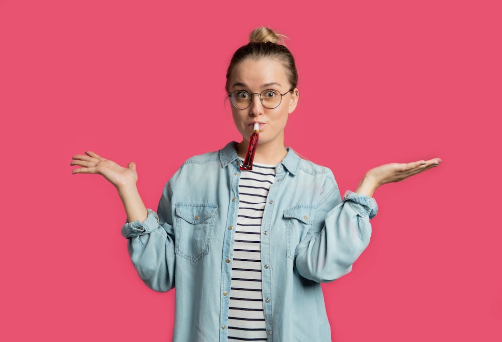 Girl blowing horn