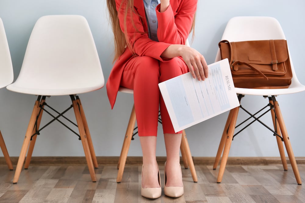 Girl holding her resume